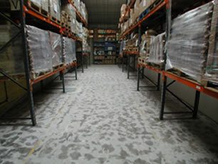 Warehouse Before Self Smoothing Resin Flooring Treatment