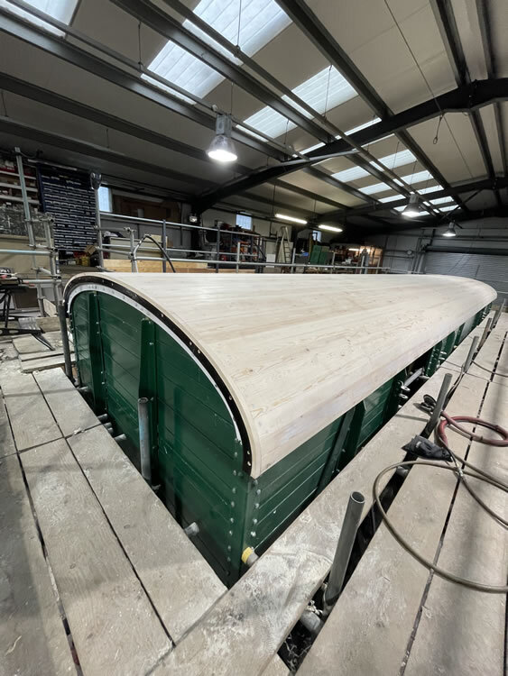 Heritage railway carriage restoration. New Canvas roof, flexible, watertight and tear resistant system developed and supplied by Specialist Coatings GB Ltd