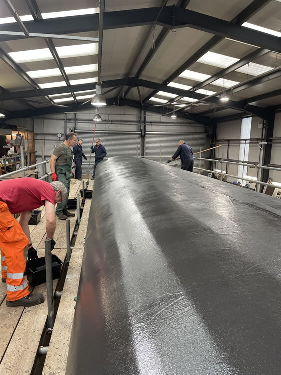 Heritage railway carriage restoration. New Canvas roof, flexible, watertight and tear resistant system developed and supplied by Specialist Coatings GB Ltd