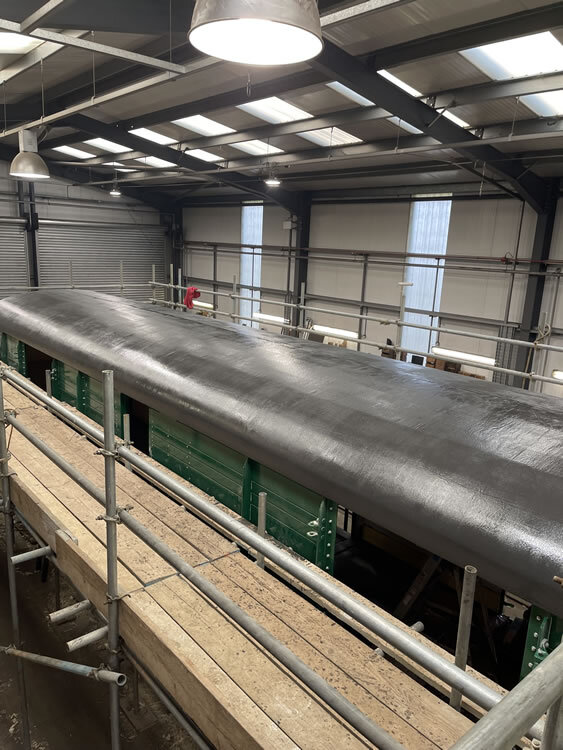 Heritage railway carriage restoration. New Canvas roof, flexible, watertight and tear resistant system developed and supplied by Specialist Coatings GB Ltd