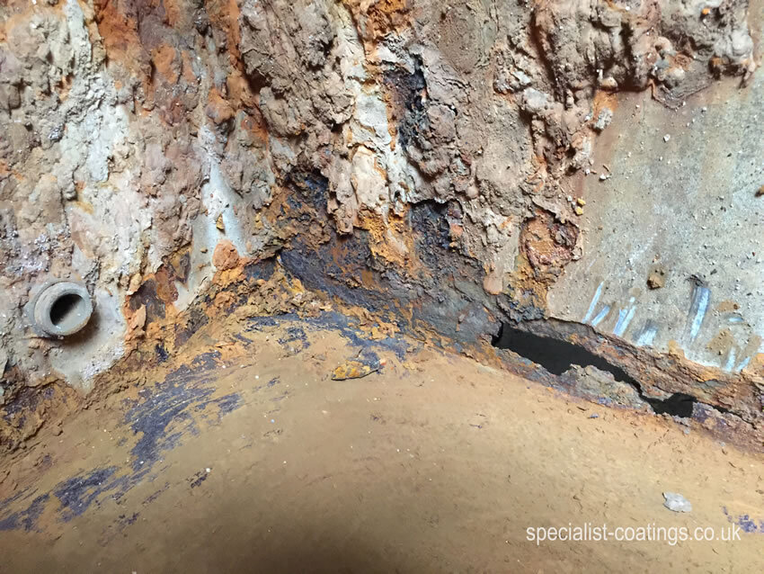 Specialist Coatings (GB) Ltd: Corroded steel water tank repair and lining service.