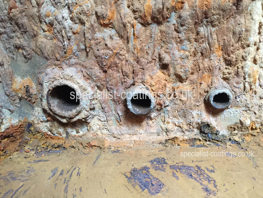 Specialist Coatings (GB) Ltd: Corroded steel water tank repair and lining service.