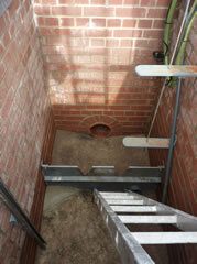 Damp Brick chamber lining - before treatment