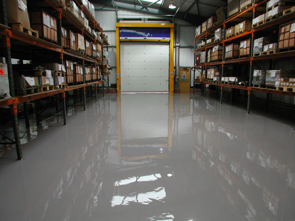 Warehouse Before Self Smoothing Resin Flooring Treatment